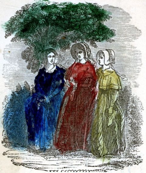 three women in colorful dresses
