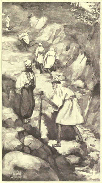 The men climb the mountain