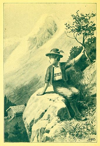 Boy in lederhosen sitting on a rock on the side of a mountain