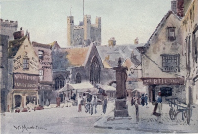 PEASHILL

The Chancel of St. Edward’s Church is seen behind the stalls in the
roadway, and the Tower of Great St. Mary’s in the distance. On the right
is the Old Bell Inn and the old town pump is in the foreground.